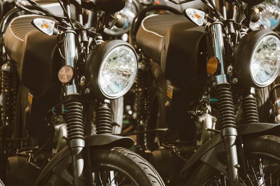 Black motorcycles and automotive vehicles